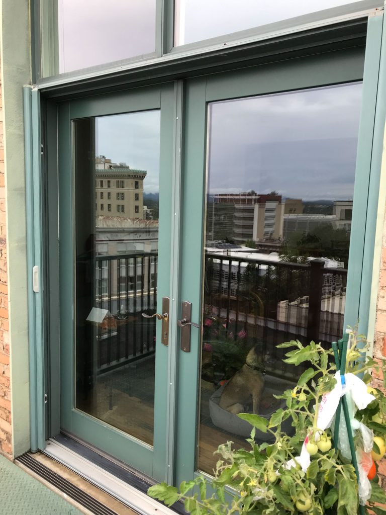 Walnut Door Lifted to Upper Floor Condo